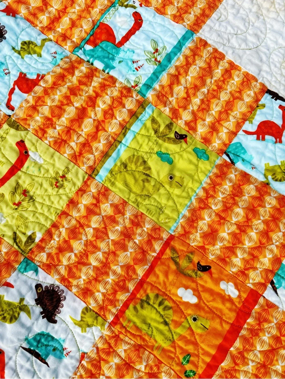 Playful Dino Patchwork Handmade Baby Quilt - Aqua & Orange